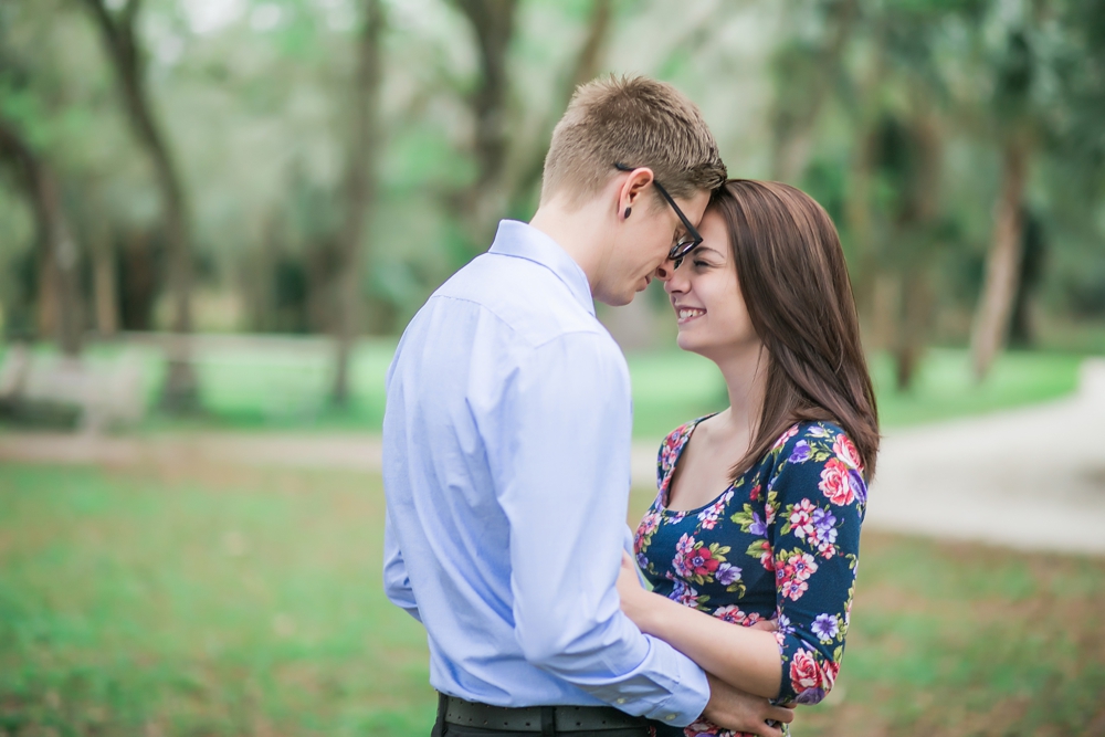 engaged couple hugging